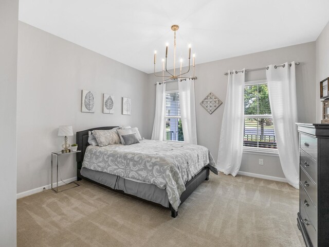 711 Hatwood Ct, Duncan, SC 29334 - bedroom featuring a chandelier and light colored carpet