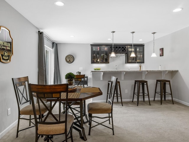 711 Hatwood Ct, Duncan, SC 29334 - carpeted dining space with bar with sink and recessed lighting