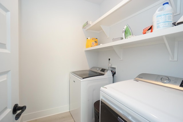 125 Patton St, Fountain Inn, SC 29644 - laundry room with washer and dryer and light wood finished floors