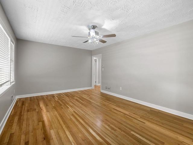 177 Continental Dr, Spartanburg, SC 29302 - unfurnished room featuring hardwood / wood-style floors, ceiling fan, and a textured ceiling