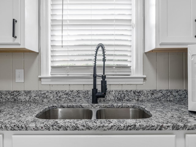177 Continental Dr, Spartanburg, SC 29302 - kitchen view of white cabinetry and light stone countertops