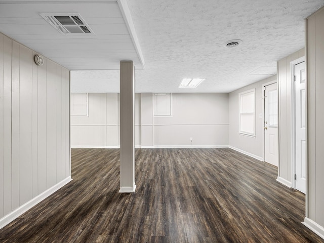 177 Continental Dr, Spartanburg, SC 29302 - below grade area with dark wood-style floors and baseboards