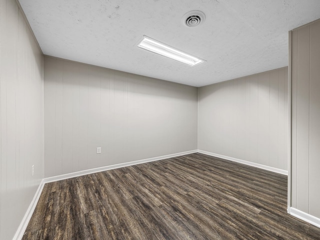 177 Continental Dr, Spartanburg, SC 29302 - empty room featuring dark wood finished floors and a textured ceiling
