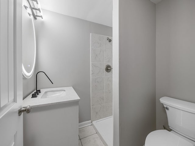 177 Continental Dr, Spartanburg, SC 29302 - bathroom featuring vanity, tiled shower, and marble finish floors