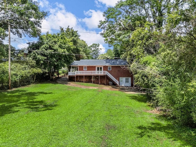 177 Continental Dr, Spartanburg, SC 29302 - back of property featuring stairway, a wooden deck, and a yard