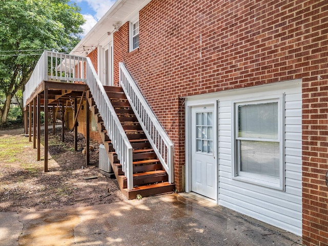 177 Continental Dr, Spartanburg, SC 29302 - view of exterior entry featuring brick siding and a wooden deck