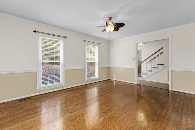 21 Glen Eagle Pl, Spartanburg, SC 29301 - spare room with wood finished floors, stairway, crown molding, and ceiling fan