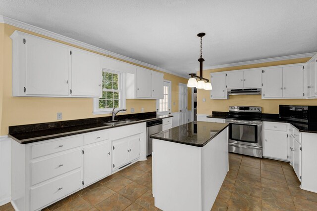 21 Glen Eagle Pl, Spartanburg, SC 29301 - kitchen with stainless steel appliances, under cabinet range hood, white cabinets, crown molding, and a kitchen island