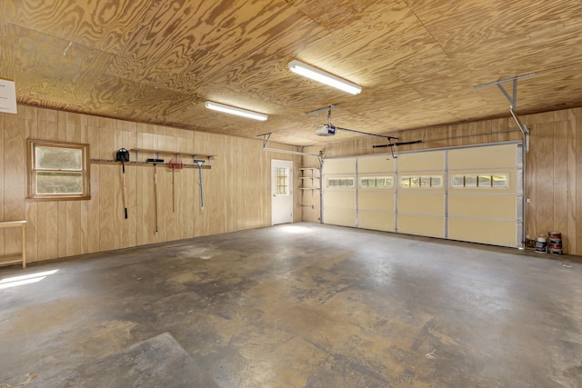 21 Glen Eagle Pl, Spartanburg, SC 29301 - garage featuring a garage door opener and wood walls