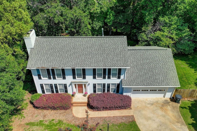 21 Glen Eagle Pl, Spartanburg, SC 29301 - colonial inspired home featuring roof with shingles, a chimney, and concrete driveway