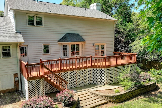 21 Glen Eagle Pl, Spartanburg, SC 29301 - back of property featuring a deck, a chimney, and roof with shingles