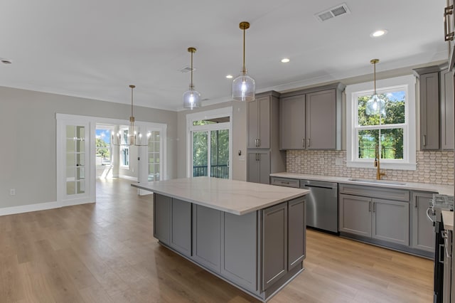 11555 New Cut Rd, Campobello, SC 29322 - kitchen with appliances with stainless steel finishes, gray cabinets, a kitchen island, ornamental molding, and recessed lighting