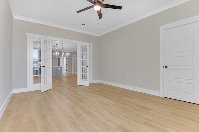 11555 New Cut Rd, Campobello, SC 29322 - unfurnished room featuring french doors, ornamental molding, light wood finished floors, a ceiling fan, and a chandelier