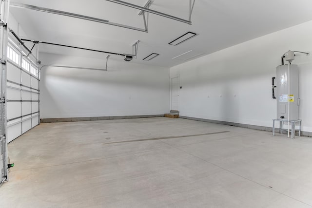 11555 New Cut Rd, Campobello, SC 29322 - garage featuring water heater and a garage door opener