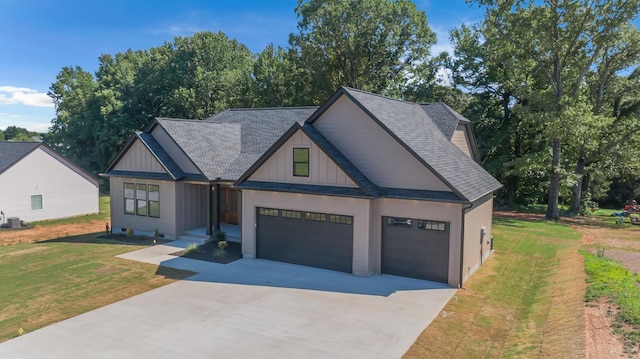 11555 New Cut Rd, Campobello, SC 29322 - view of front of home featuring driveway, a shingled roof, a front lawn, and board and batten siding