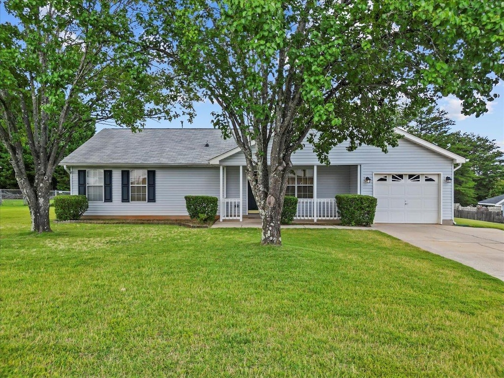 239 Milky Way, Greer, SC 29651 - view of front of property with a garage, a porch, and concrete driveway