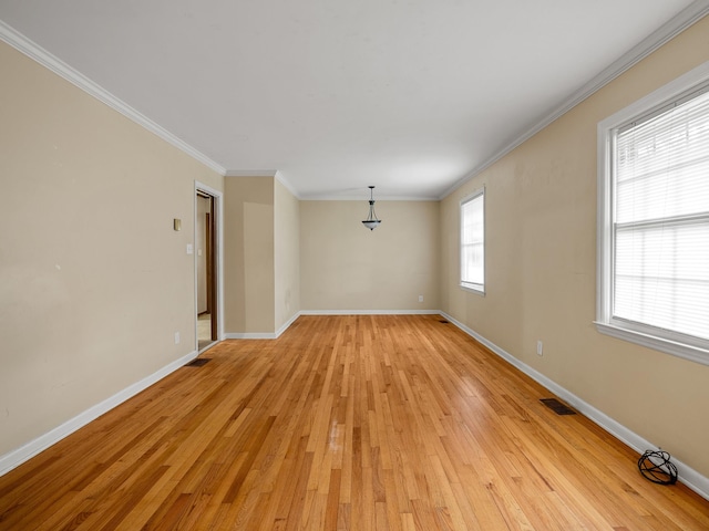 308 Pine Lake Ct, Spartanburg, SC 29301 - spare room featuring light wood finished floors and ornamental molding