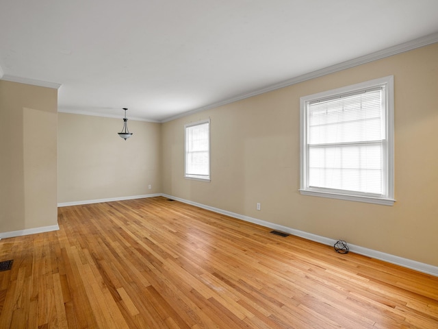 308 Pine Lake Ct, Spartanburg, SC 29301 - spare room featuring crown molding and light wood-style floors