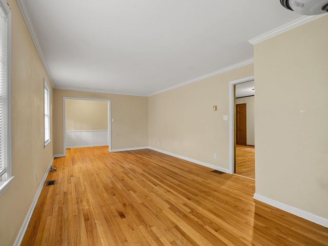 308 Pine Lake Ct, Spartanburg, SC 29301 - spare room featuring light wood-style floors and crown molding