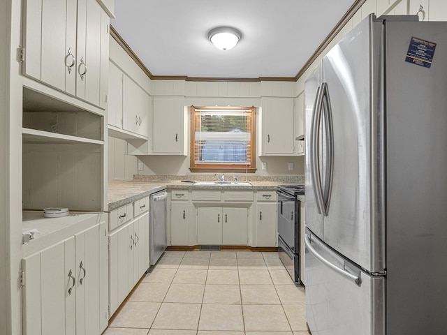308 Pine Lake Ct, Spartanburg, SC 29301 - kitchen featuring stainless steel appliances, light countertops, ornamental molding, light tile patterned floors, and white cabinets