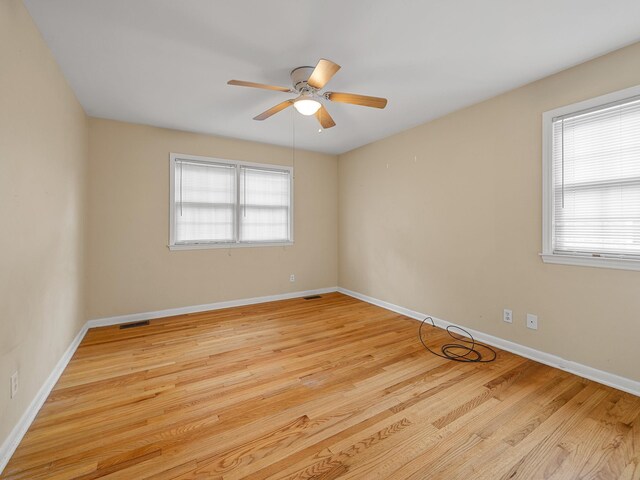 308 Pine Lake Ct, Spartanburg, SC 29301 - empty room featuring a ceiling fan and light wood-style flooring