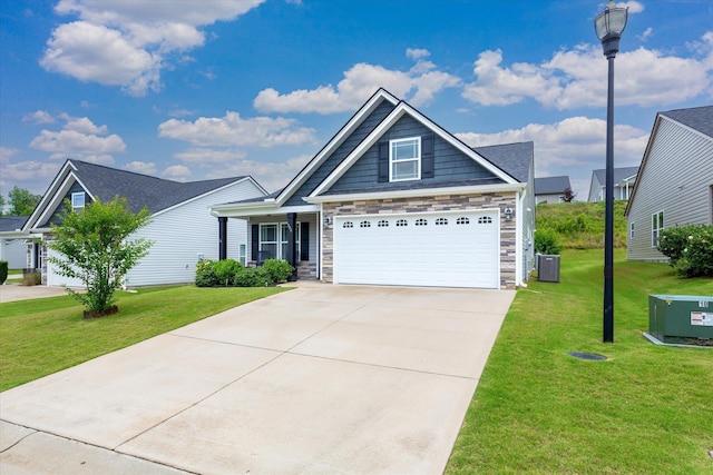 906 John Thomas Way, Greer, SC 29651 - view of front of house featuring stone siding, a front yard, and concrete driveway