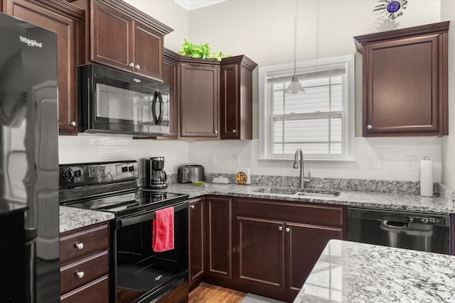 906 John Thomas Way, Greer, SC 29651 - kitchen featuring black appliances, ornamental molding, light stone countertops, and decorative backsplash