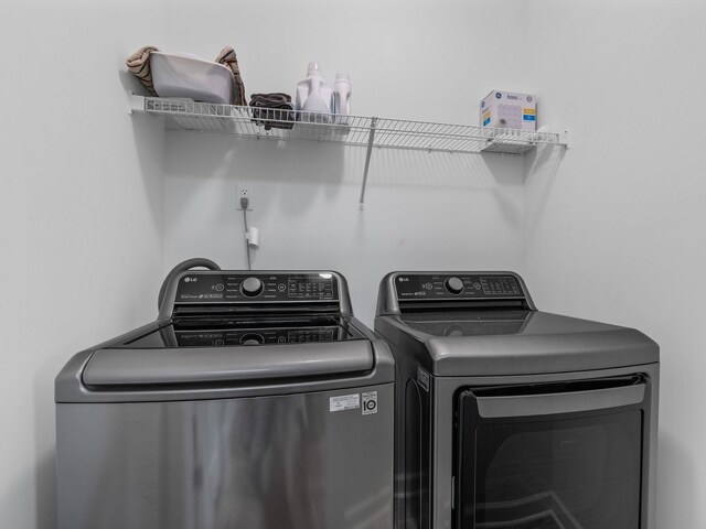 234 Page Creek Blvd, Landrum, SC 29356 - washroom featuring independent washer and dryer
