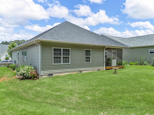 234 Page Creek Blvd, Landrum, SC 29356 - rear view of property with a shingled roof and a lawn