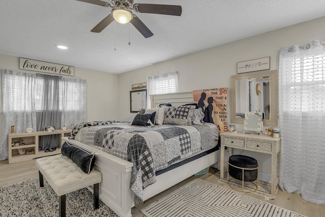 208 Kenneth Dr, Boiling Springs, SC 29316 - bedroom with wood finished floors, a textured ceiling, ceiling fan, and recessed lighting