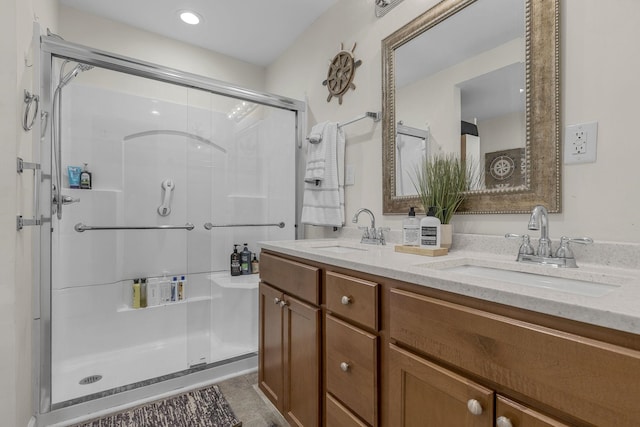 208 Kenneth Dr, Boiling Springs, SC 29316 - bathroom with a shower stall, double vanity, tile patterned flooring, and recessed lighting