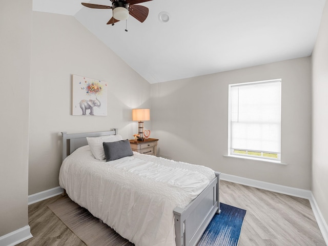 116 Dodd St, Wellford, SC 29385 - bedroom with light wood finished floors, vaulted ceiling, and a ceiling fan