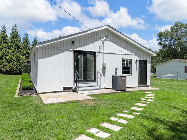 116 Dodd St, Wellford, SC 29385 - back of house with entry steps, a yard, and board and batten siding