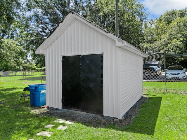 116 Dodd St, Wellford, SC 29385 - view of shed with view of wooded area and a carport
