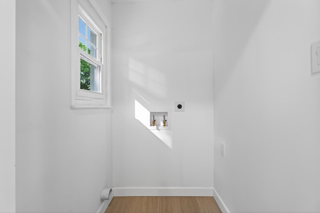 177 Lincoln Dr, Spartanburg, SC 29306 - washroom with hookup for an electric dryer, hookup for a washing machine, and wood finished floors
