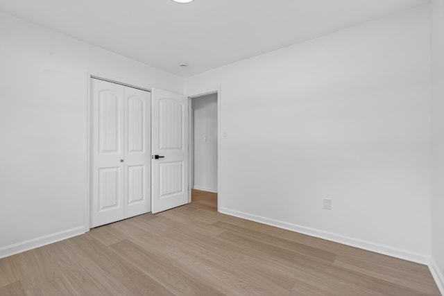 177 Lincoln Dr, Spartanburg, SC 29306 - unfurnished bedroom featuring light wood-style floors and a closet