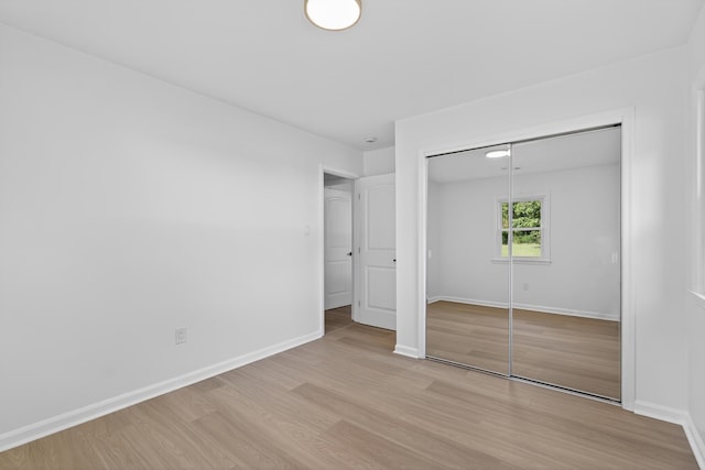 177 Lincoln Dr, Spartanburg, SC 29306 - unfurnished bedroom featuring light wood-style flooring and a closet