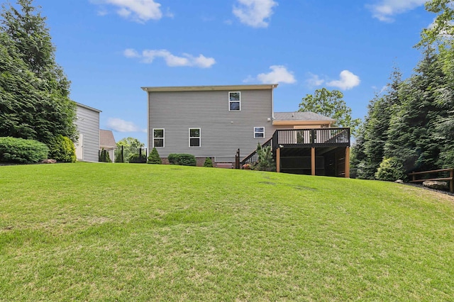 31 Goodwin Farms Ct, Travelers Rest, SC 29690 - rear view of house featuring a wooden deck, stairway, and a lawn