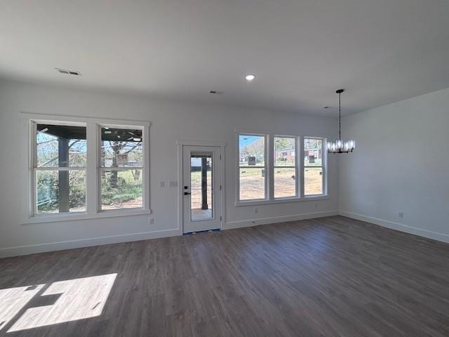 451 Park St, Inman, SC 29349 - unfurnished living room featuring dark wood-style floors, healthy amount of natural light, a chandelier, and recessed lighting