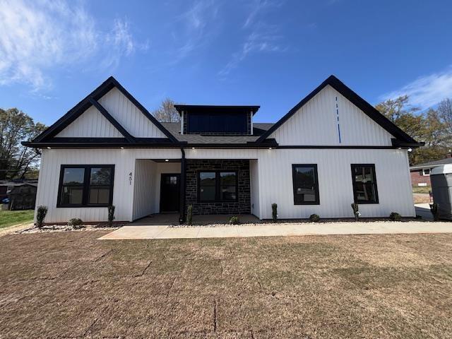 451 Park St, Inman, SC 29349 - back of house featuring a yard and covered porch
