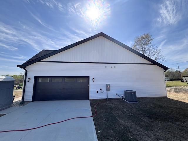 451 Park St, Inman, SC 29349 - view of property exterior featuring concrete driveway and an attached garage