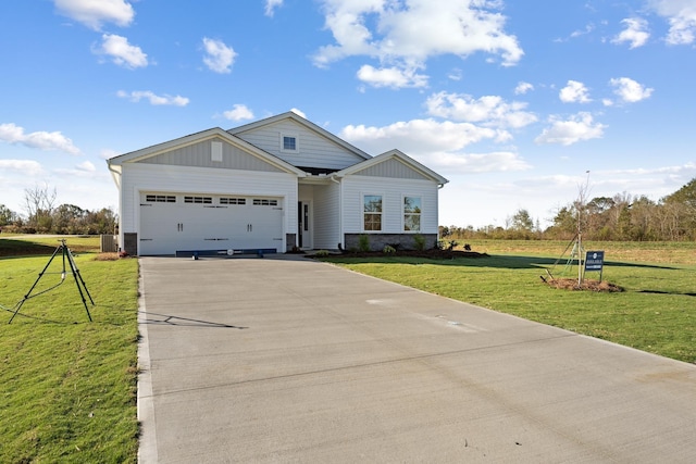 1465 Macedonia Rd, Gaffney, SC 29341 - view of front of property with concrete driveway, an attached garage, a front lawn, and board and batten siding