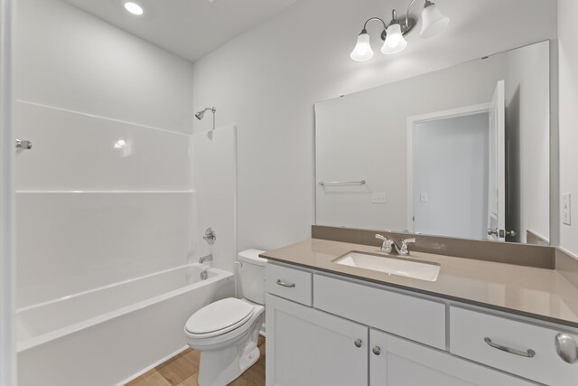 1465 Macedonia Rd, Gaffney, SC 29341 - full bath with wood finished floors, vanity, and tub / shower combination