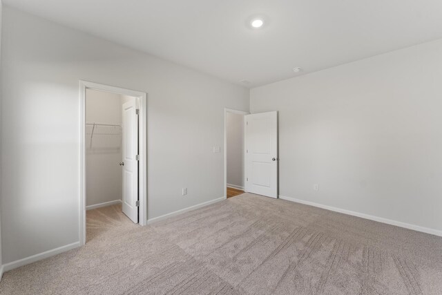 1465 Macedonia Rd, Gaffney, SC 29341 - unfurnished bedroom featuring carpet floors, a spacious closet, and a closet