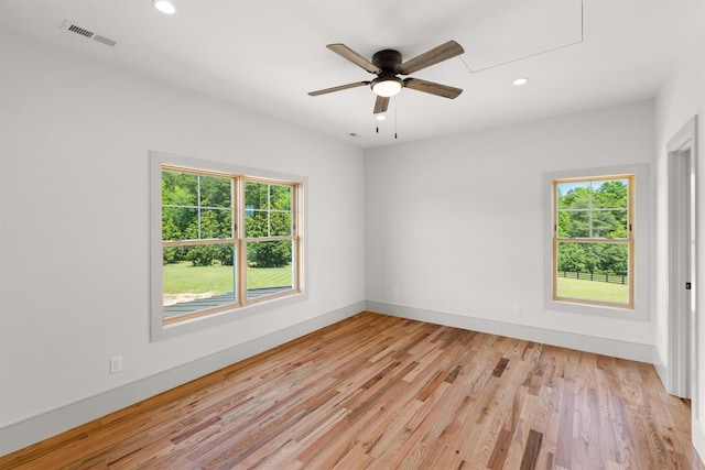 621 Bascule Ridge Ln, Campobello, SC 29322 - spare room with plenty of natural light, recessed lighting, light wood-style flooring, a ceiling fan, and attic access