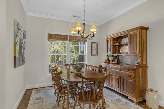 346 Bub Dr, Chesnee, SC 29323 - dining room with a chandelier, wood finished floors, and crown molding