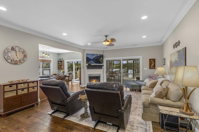 346 Bub Dr, Chesnee, SC 29323 - living area featuring crown molding, ceiling fan, dark wood-type flooring, recessed lighting, and a lit fireplace