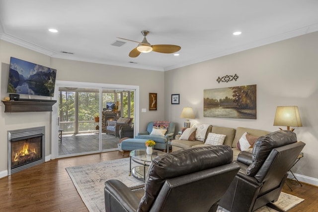 346 Bub Dr, Chesnee, SC 29323 - living area with a lit fireplace, a ceiling fan, wood-type flooring, ornamental molding, and recessed lighting