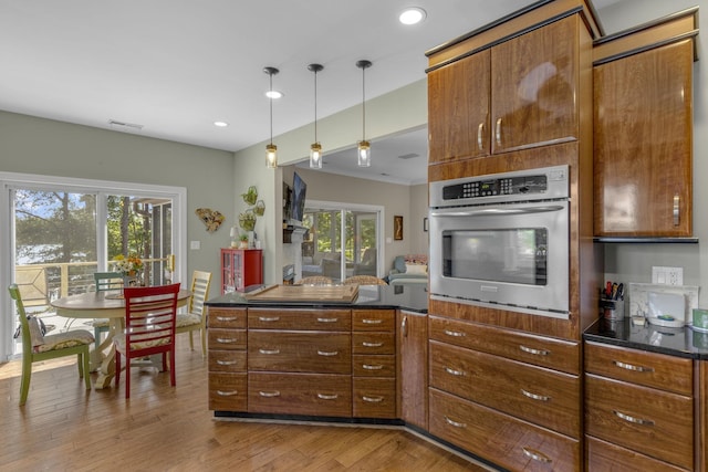 346 Bub Dr, Chesnee, SC 29323 - kitchen with oven, dark countertops, wood finished floors, plenty of natural light, and recessed lighting