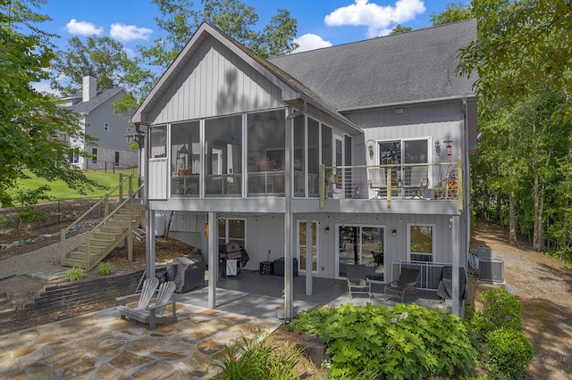 346 Bub Dr, Chesnee, SC 29323 - back of property with a patio area, a shingled roof, a sunroom, and stairway